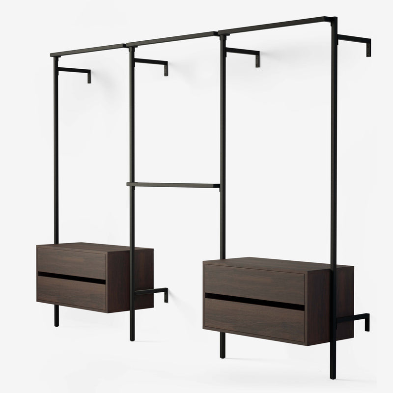 Walk in system with 2 smoked oak chests of drawers and 4 hanging rails to hang clothes on. For both short and long.